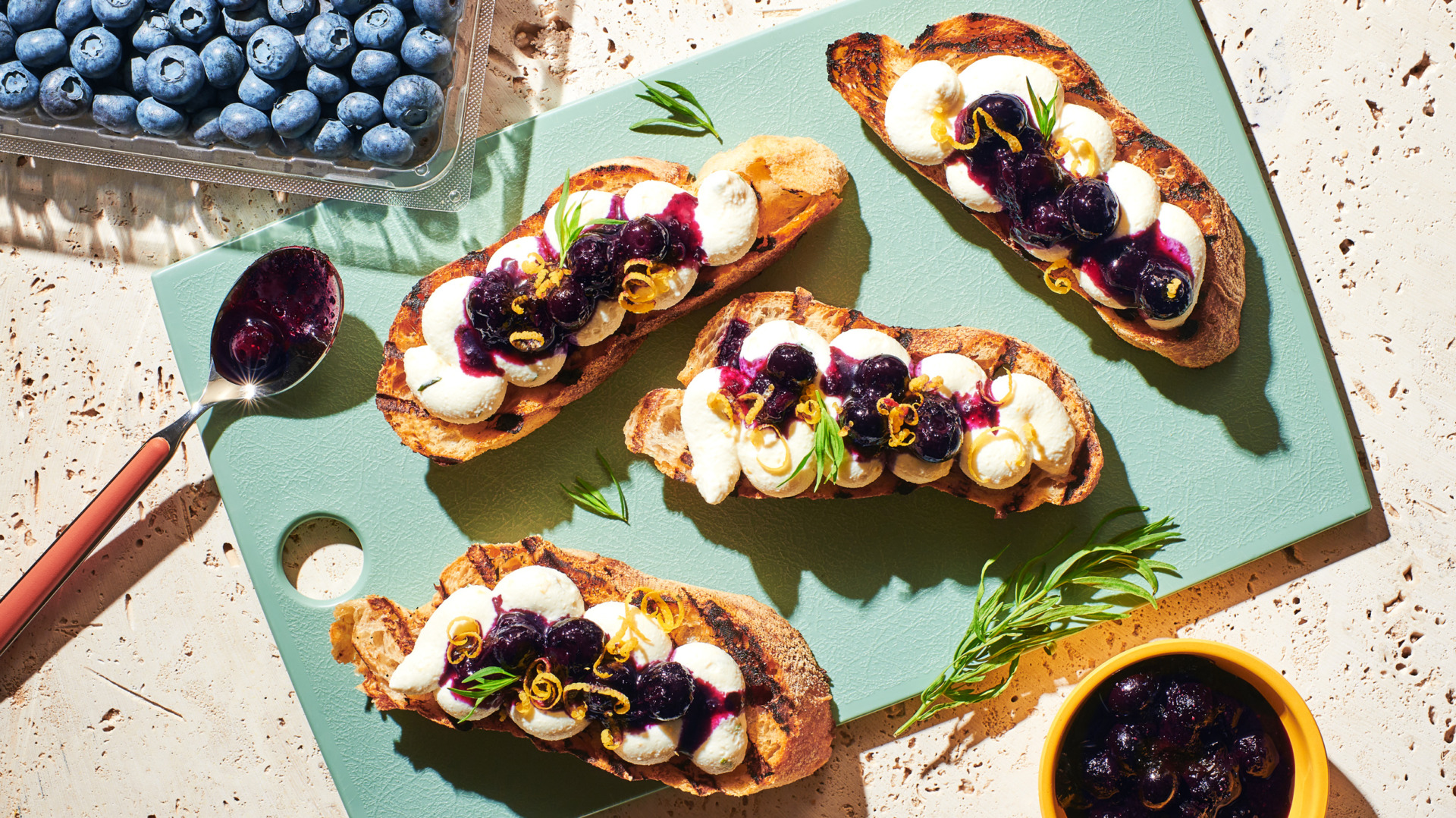 Image of Always Fresh Blueberry and Whipped Ricotta Grilled Bruschetta with a tray of Always Fresh