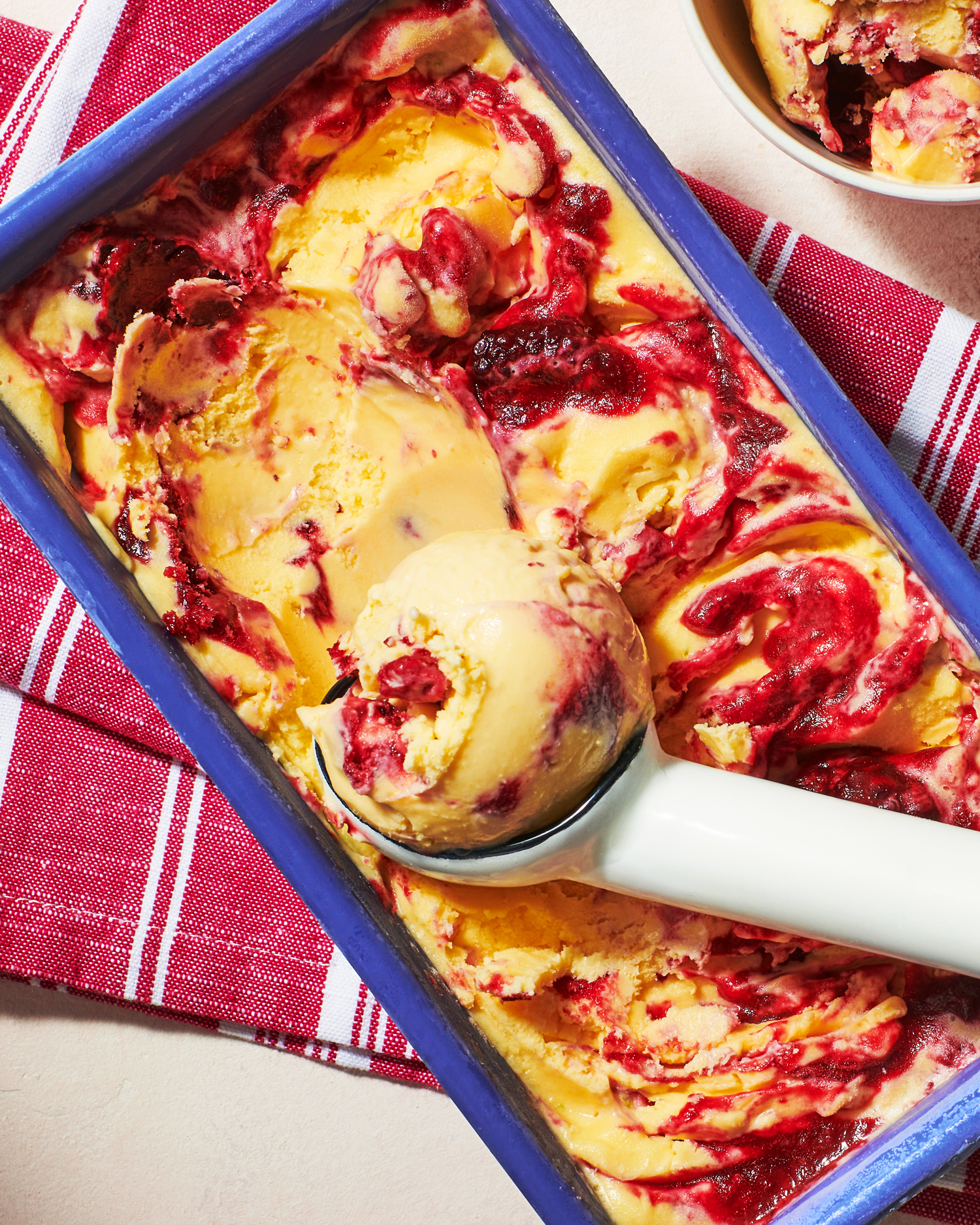 Image of Always Fresh Sweet Corn ice cream with a mixed berry swirl